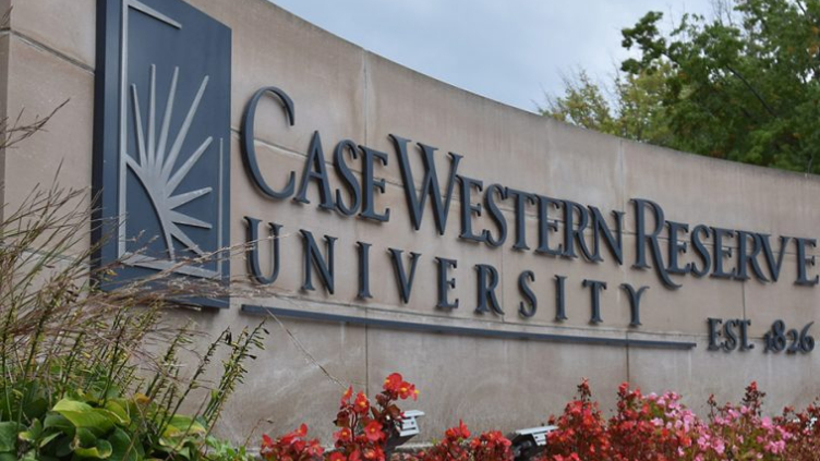 Case Western Reserve University sign with flowers