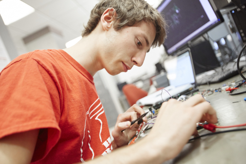 Case Western Reserve University student working on an engineering project